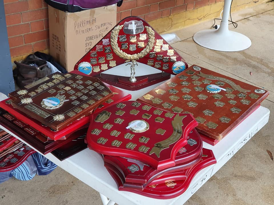 Club trophies and shields laid out on a table at Epping.
